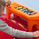 Illustration for article titled This Race Car Bed Is a Giant Extension Of Your Kid's Hot Wheels Tracks